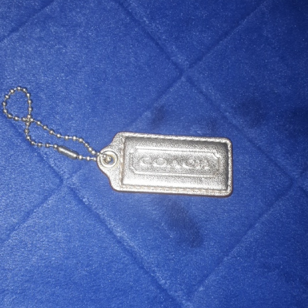 Coach Gold Tag